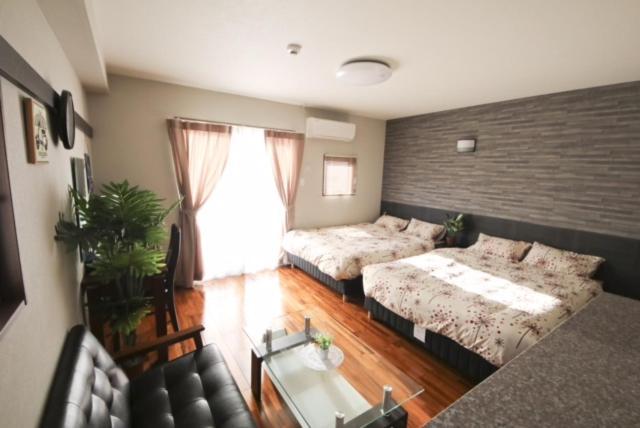 โอโย โฮเต็ล ชูระ กานะ เฮาส์ สึโบงาวะ นาฮะ Apartment ภายนอก รูปภาพ